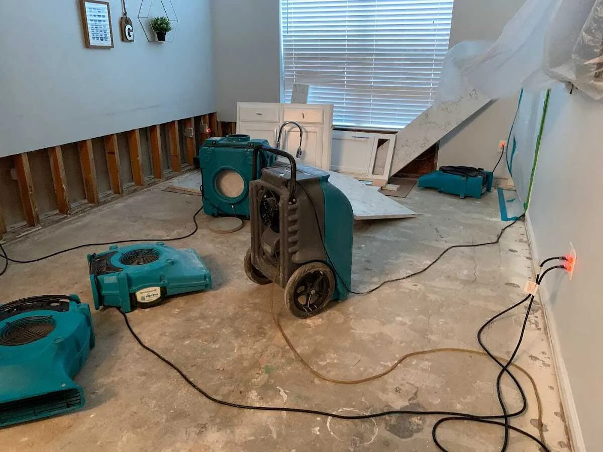 Dehumidifier in flood-cut room for Water Damage Restoration in Leland